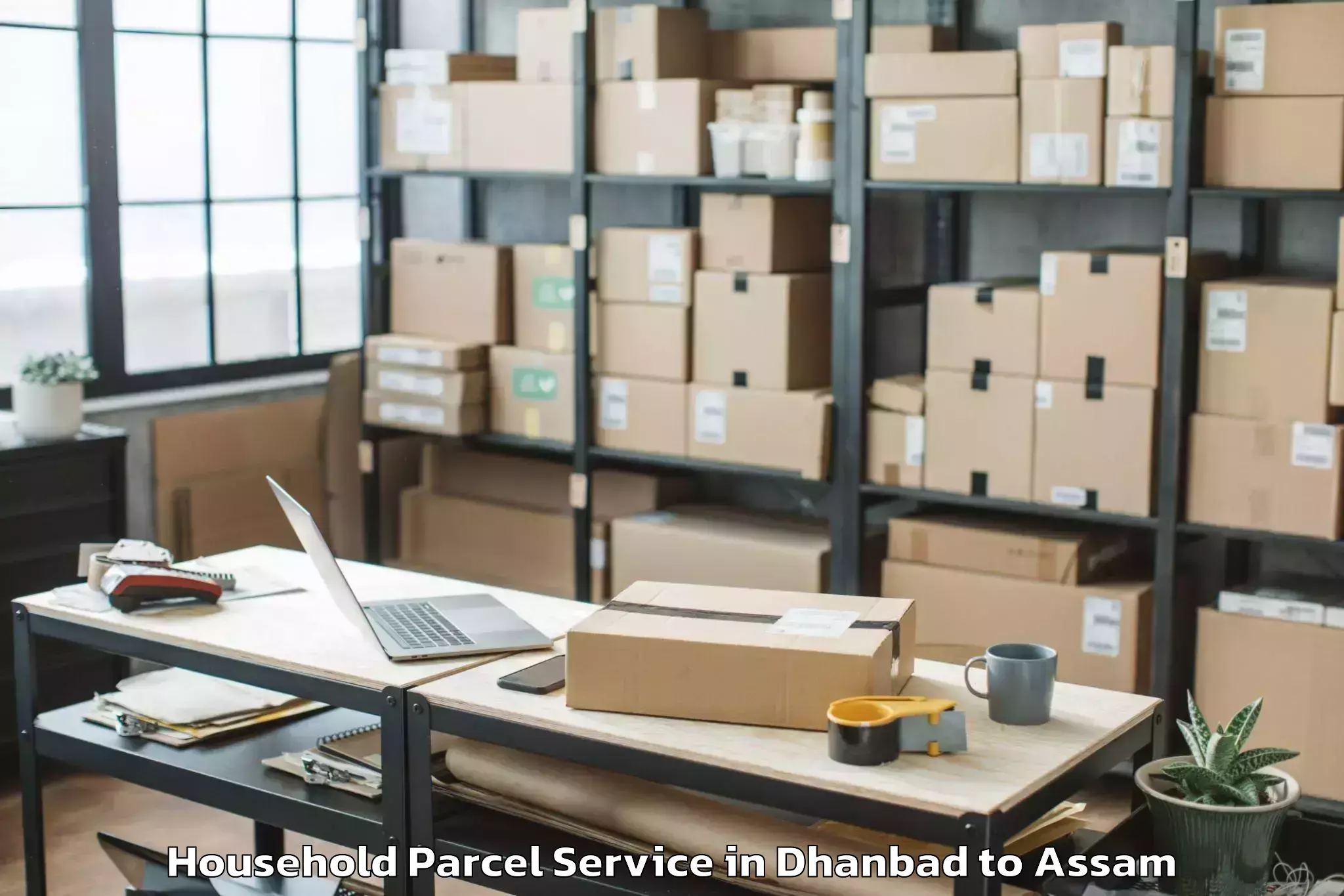 Book Dhanbad to Goshaingaon Household Parcel Online